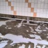 Грунтование, шпатлевание дефектов пола после его шлифовки